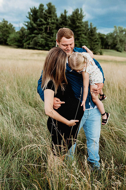 Maternity session taken in a field in Akron, NY.